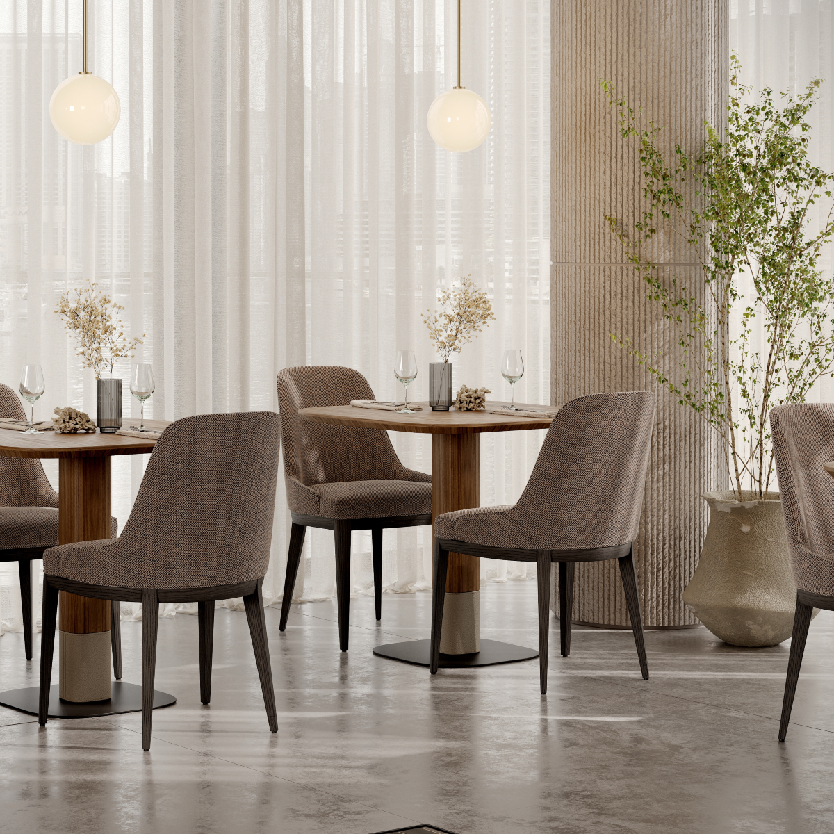 Inside a restaurant, tables and chairs are set up in front of a bright window.