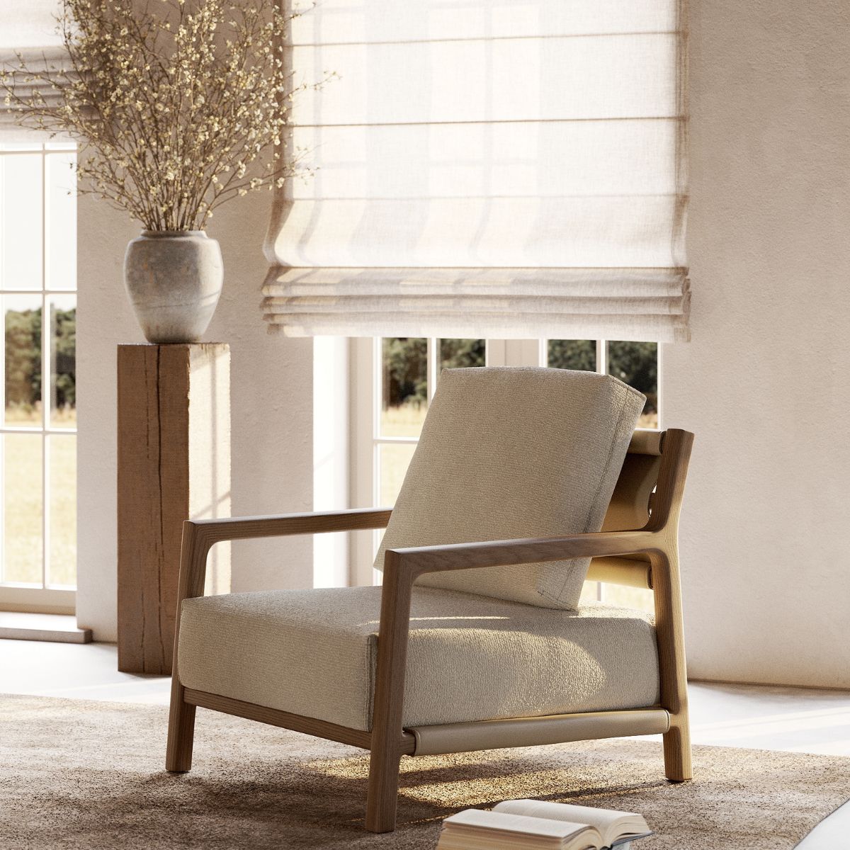 summer bedroom trends 2026 by domkapa (9) Alton armchair by Domkapa located in a sunlit room, adjacent to a window and a collection of books on a shelf. Summer bedroom trends.